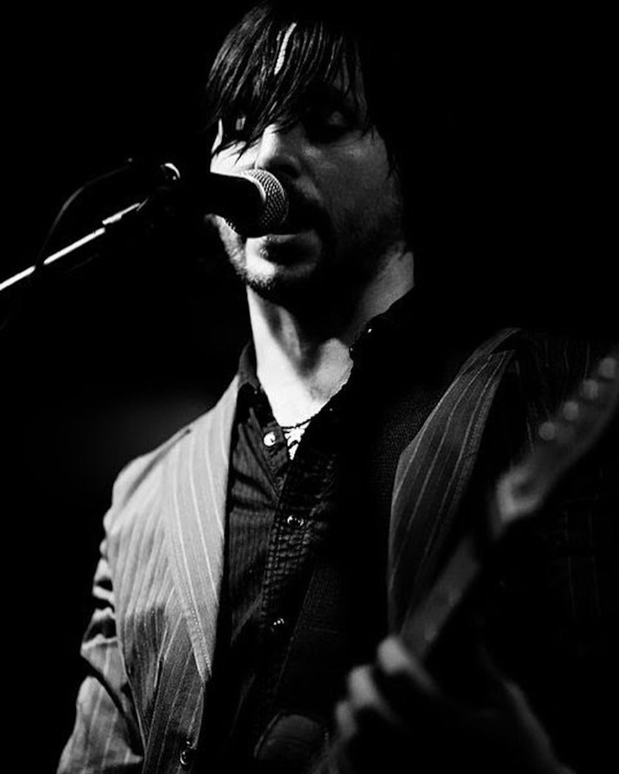 Todd Sapio performing live, black and white